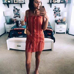 Burnt orange Button up dress.